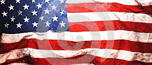 Rough faded US American flag background or wallpaper photo