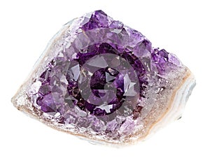 rough geode of amethyst crystals isolated