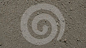 Rough Grainy Concrete Surface with Coarse Texture and Color Variations