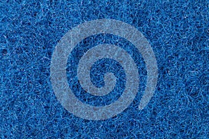 Rough hard surface in blue as a background, copy space