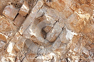 Rough large natural stone wall, background.