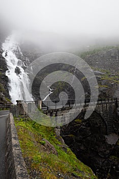 Rough mountain sides around the Trollstigen mountain pass that twists through 11 hairpin bends up the steep mountains of Romsdalen