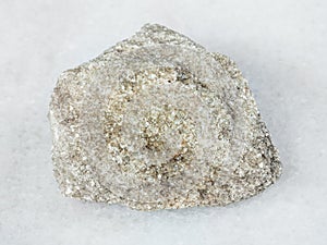 rough muscovite greisen rock on white