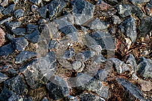 Rough natural stone wall or floor texture