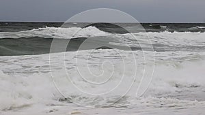 Rough ocean waves crashing on to the shore line of Fire Island New York