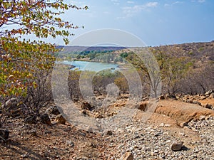 Rough offroad track with large ruts along Kunene River between Kunene River Lodge and Epupa Falls, Namibia, Africa