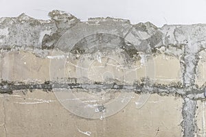 Rough peeled concrete wall background with whitewash