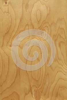Rough plywood wood grain background close up