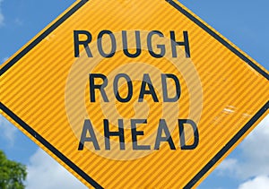 Rough road ahead sign