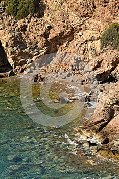 rough and rocky shore line of kalymnos Island Greece