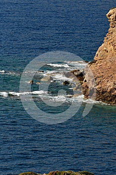 rough and rocky shore line of kalymnos Island Greece