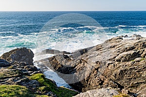 Rough and rocky shore at Malin Head, Ireland\'s northernmost point, Wild Atlantic Way, spectacular coastal route.