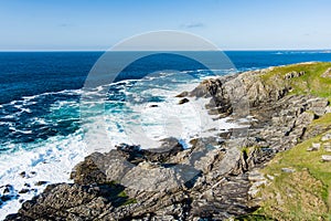 Rough and rocky shore at Malin Head, Ireland\'s northernmost point, Wild Atlantic Way, spectacular coastal route.