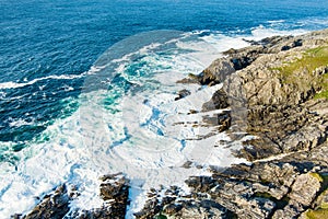 Rough and rocky shore at Malin Head, Ireland\'s northernmost point, Wild Atlantic Way, spectacular coastal route.