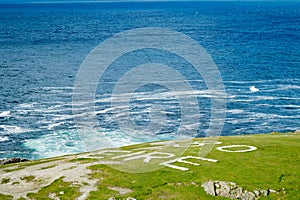 Rough and rocky shore at Malin Head, Ireland\'s northernmost point, Wild Atlantic Way, spectacular coastal route. Numerous