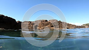 Rough sea by Alghero rocky shore. Sardinia