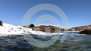 Rough sea by Alghero rocky shore. Sardinia