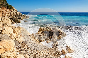 Rough sea and amazing stony beach