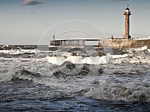 Rough sea with pier in whitby