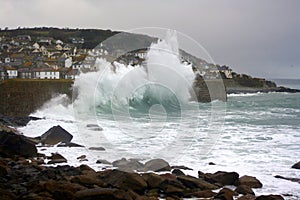 Rough seas breaking on breakwater