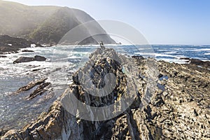 Rough stone on coast in Tsitsikamma National Park, South Africa