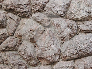 Rough stone wall surface