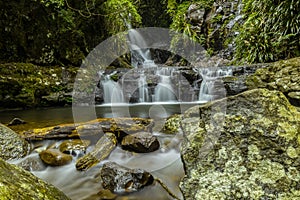 Rough stones near waterfall