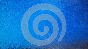 The rough surface of the microwavable glass plate and has a circular groove in the center. Shines with blue lights from below to