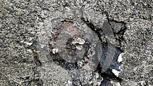 Rough texture of beach stones, abstract background of boulders.