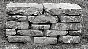 Rough textured surface of an old stone and brick wall
