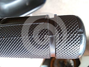 rough textured upholstery rubber grip of motorcycle handlebars