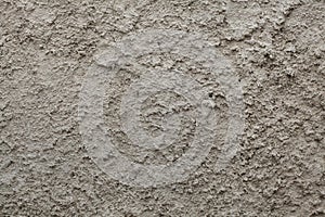 Rough unpainted concrete wall. photo