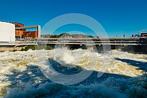 Rough waters of bypass on rapids Kuusankoski, Finland