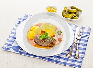 Roulades beef with sauce, mustard and gherkins