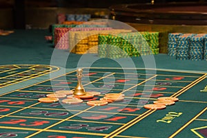 Roulette gambling chips on the table