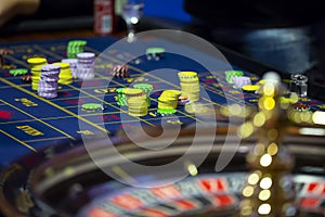 Roulette table in casino human hands