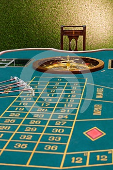Roulette table in the casino photo