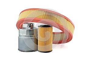 Round air, fuel and oil filters isolated on a white