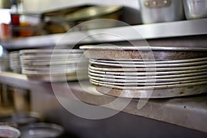Round baking pans in restaurant kitchen