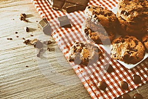 Round biscuits on dish with black chocolate elevated vintage