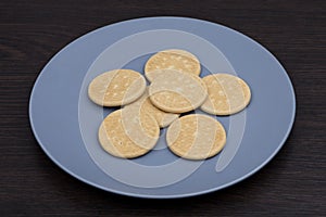 Round biscuits on a gray plate