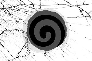 Round black hole with cracks isolated on white background