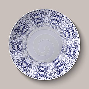 Round blue floral ornament oriental style. Pattern shown on the ceramic platter.