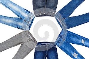 Round Blue jeans denim set isolated on white background with copy space. Top view and mock up clothes. Male female pants collage