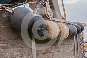 round buoys as ram protection on ship