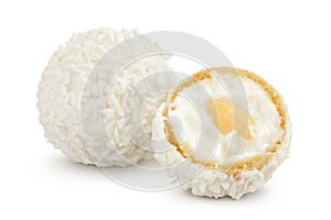 round candy raffaello with coconut flakes and nut isolated on white background