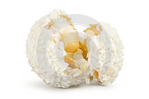 round candy raffaello with coconut flakes and nut isolated on white background