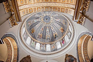 Round ceiling in a Catholic church with painting