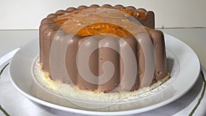 round chocolate souffle cake on a platter