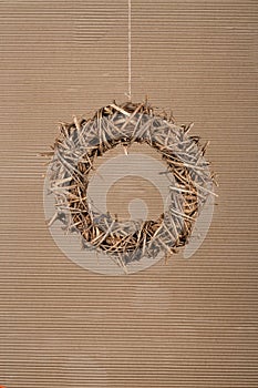 Round Christmas Wreath Natural Twigs on Old Cardboard Background